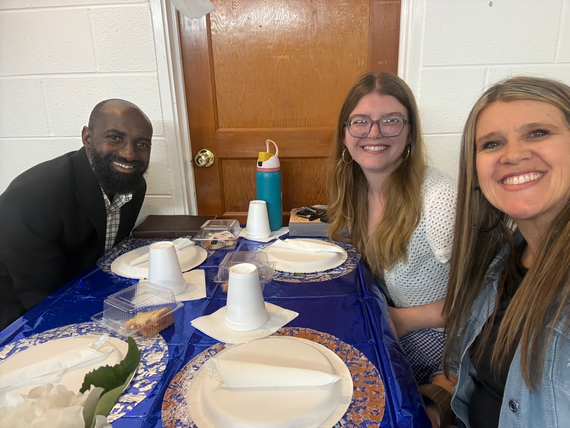 Friends gathering for fellowship around a meal