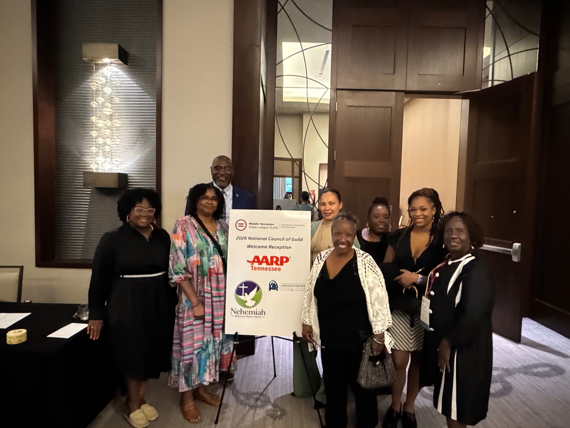 Group from Nehemiah MBC posing together at the National Council of Guild Welcome Reception